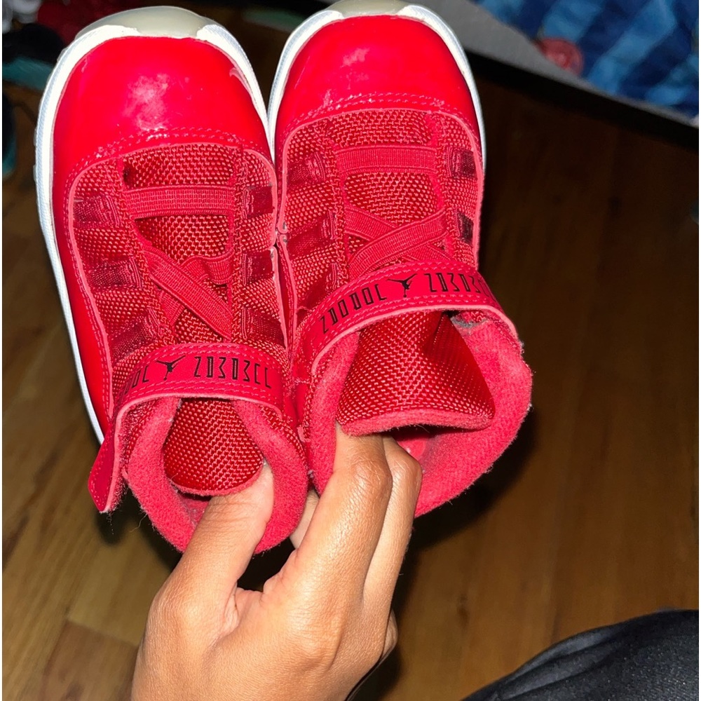 - Nike air Jordan red bred 11’s